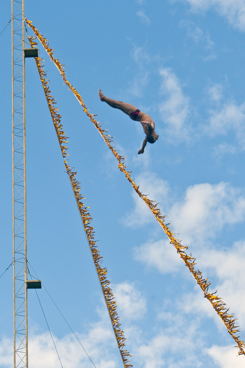 Chris Detrick  |  The Salt Lake Tribune
University of Utah graduate Brad Hunt dives off the 80 foot platform into a pool of water at the Utah State Fair Thursday September 6, 2012.