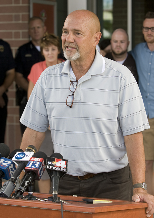 Rick Egan  | The Salt Lake Tribune 

Randy Johnson, father of Draper Police Sgt. Derek Johnson, speaks to the press at the Draper City Hall, Monday, September 2, 2013.