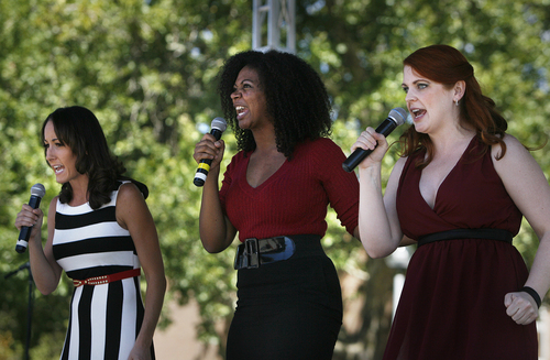 Scott Sommerdorf   |  The Salt Lake Tribune
Ashley Gardner-Carlson, left, Latoya Rhodes, and Ginger Bess, at right, sing "There's Gotta Be Something Better Than This" from Sweet Charity at The University of Utah's College of Fine Arts Arts Bash on the Library Plaza, Wednesday, September 4, 2013.