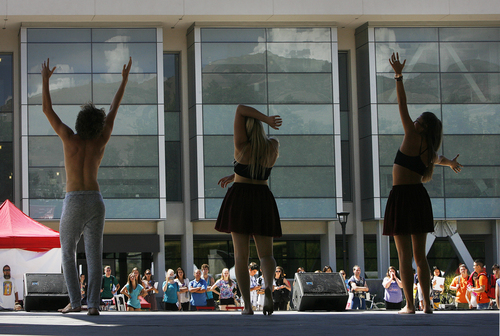 Scott Sommerdorf   |  The Salt Lake Tribune
The University of Utah's Ballet Department dances a piece called "The Journey" during the College of Fine Arts' 3rd annual Arts Bash on the Library Plaza, Wednesday, September 4, 2013.