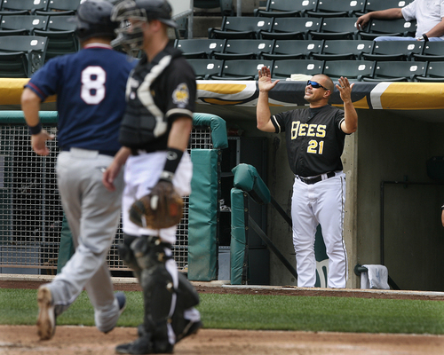 Scott Sommerdorf   |  The Salt Lake Tribune
As another Reno runner scores, Bees manager Keith Johnson reacts to a fielding error during a disastrous six-run, second inning, when Reno took a commanding 6-1 lead. The Salt Lake Bees lost 10-7 to the Reno Aces, Sunday, September 1, 2013.