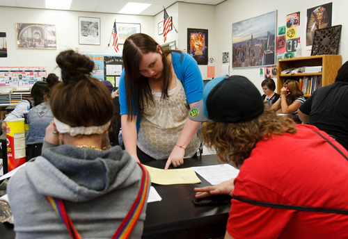Trent Nelson  |  The Salt Lake Tribune
Teacher Kellie Fay works with students at Polaris High School Friday, August 30, 2013 in Orem.