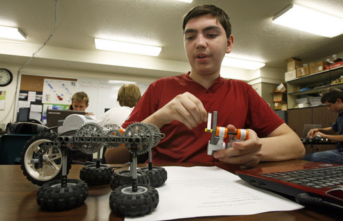 Francisco Kjolseth  |  The Salt Lake Tribune
Quinn Melville, 15, maneuvers his walking robot as part of a project in his Mechatronics class at the Utah Academy of Sciences. The Utah State Office of Education released the school grades and rankings mandated by the state legislature in which UCAS received an "A" grade earning 642 of 750 points, indicating the highest academic ranking in the state. UCAS is a public early college STEM (Science, Tech, Engineering & Math) charter school located on the UVU campus in Orem.