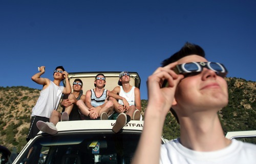 Kim Raff | The Salt Lake Tribune
People from Mapleton, Utah gather at the viewing area and watch the annular solar eclipse in Kanarraville, Utah on May 20, 2012.