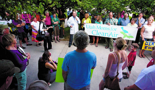 Steve Griffin | The Salt Lake Tribune

Citizens concerned about Rep. Chris Stewart's, R-Utah positions on science, the EPA and clean air regulations listen to Brian Moench, of the Utah Physicians for Healthy Environment, during a rally outside the Sweet Library in Salt Lake City, Utah Wednesday Sept. 4, 2013 before Stewart's town hall meeting in the Salt Lake City Avenues neighborhood.