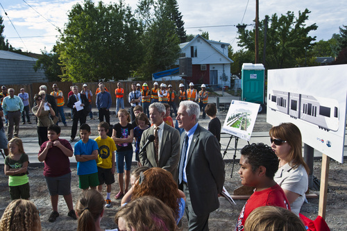 Chris Detrick  |  The Salt Lake Tribune
Surrounded by fifth and sixth-graders from Hawthorne Elementary, Salt Lake City Mayor Ralph Becker and UTA Chief Capital Development Officer Steve Meyer speak at the Sugar House streetcar S Line Corridor near 800 East and 2200 South Thursday September 5, 2013. The streetcar is scheduled to be running for the public on December 8.