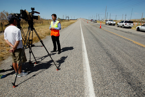 Trent Nelson  |  The Salt Lake Tribune
Robert Hull, director of Traffic and Safety for the Utah Department of Transportation (UDOT,) talks about how drivers can better prevent a rollover crash by running over  "delineator posts" on the shoulder of the road, showing they are designed to fall over so cars need not swerve around them. Thursday, September 5, 2013.