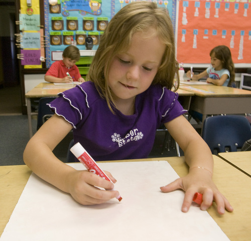 Rick Egan  | The Salt Lake Tribune 

Bree Van Etten works in Claire Maliejewski's first grade class on Wednesday.Lawmakers who support Utah's new system for giving letter grades to schools point to Polk Elementary, which received a 'B' grade, as a success story.