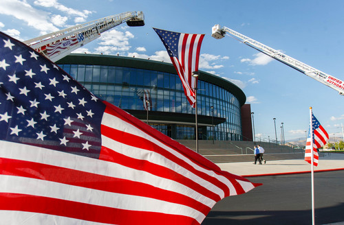 Trent Nelson  |  The Salt Lake Tribune
Flags set the scene at the Maverik Center in West Valley City on Thursday for the viewing for Sgt. Derek Johnson, the Draper police officer who was shot to death on Sunday morning.