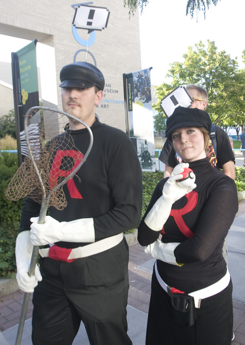 Rick Egan  | The Salt Lake Tribune 

Darren and Elora Watson, as Team Rocket, the Salt Lake ComiCon at the Salt Palace,  Wednesday, September 4, 2013.