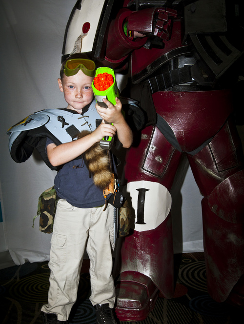 Chris Detrick  |  The Salt Lake Tribune
Will Robinson, 7, poses for a portrait as a Scout Marine from Warhammer 40K during the inaugural Salt Lake Comic Con at the Calvin L. Rampton Salt Palace Convention Center Friday September 6, 2013.