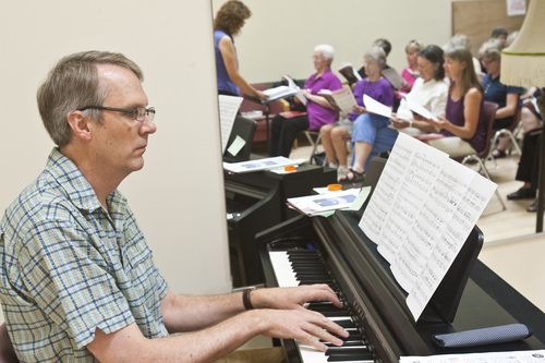 Chris Detrick  |  The Salt Lake Tribune
John Bennett plays the piano with the Salt Lake Encore Chorale during a practice at Salt Lake Community College Thursday September 5, 2013.
