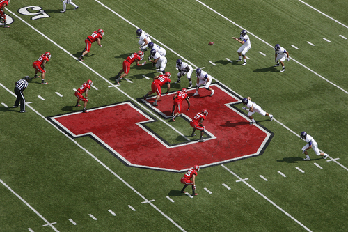 Scott Sommerdorf   |  The Salt Lake Tribune
Weber State takes a snap early in the second half near the midfield "U". Utah crushed Weber State 70-7, Saturday, September 7, 2013.