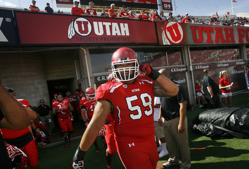 Scott Sommerdorf   |  The Salt Lake Tribune
Utah Utes offensive linesman Junior Salt (59) comes out of the locker room with other Utes during pre-game activities, Saturday, September 7, 2013.