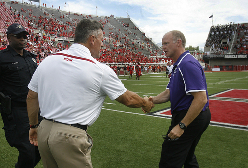 Scott Sommerdorf   |  The Salt Lake Tribune
Weber State Wildcats head coach Jody Sears, right, greets Utah head coach Kyle Whittingham after the Utes piled up 70 points against his team. Utah crushed Weber State 70-7, Saturday, September 7, 2013.