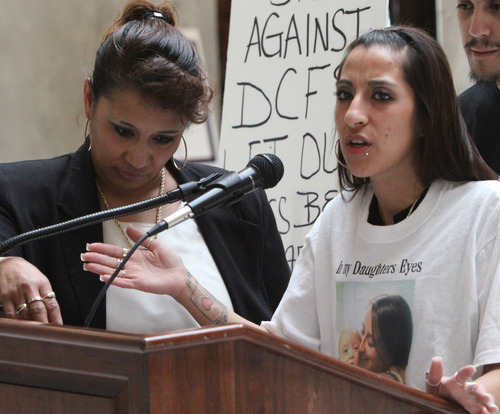 Rick Egan  | The Salt Lake Tribune 

Tonita Espinoza, left, stands by her daughter, Ashley Quintana, right, as she speaks at a rally at the Utah State Capitol, Wednesday, March 6, 2013.  Espinoza's grandson (Ashley Quintana's son) was taken away by DCFS and adopted out.
