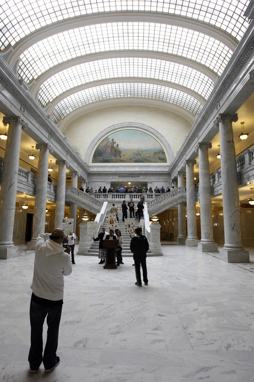Rick Egan  | The Salt Lake Tribune 

Tonita Espinoza speaks in an empty capitol rotunda, at a rally at the Utah State Capitol, Wednesday, March 6, 2013.  Espinoza's grandson (Ashley Quintana's son) was taken away by DCFS and adopted out.
