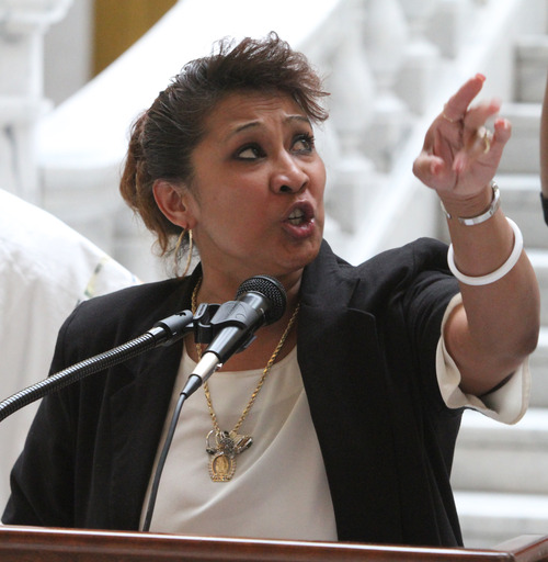 Rick Egan  | The Salt Lake Tribune 

Tonita Espinoza speaks at a rally at the Utah State Capitol, Wednesday, March 6, 2013.  Espinoza's grandson (Ashley Quintana's son) was taken away by DCFS and adopted out.