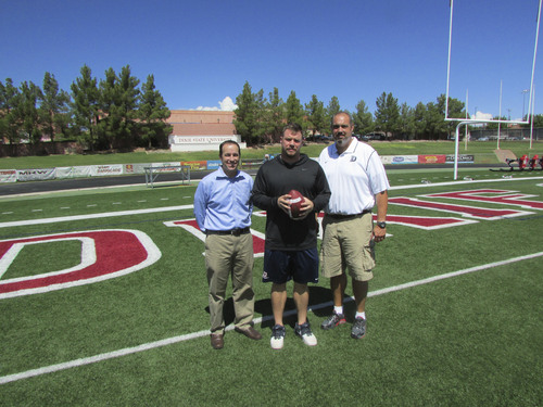 Tom Wharton  |  The Salt Lake Tribune 
Dixie State athletic director Jason Boothe, star tight end Joe Don Duncan and football coach Scott Brumfield are working to improve the Red Storm's football record since it became an NCAA Division II school.