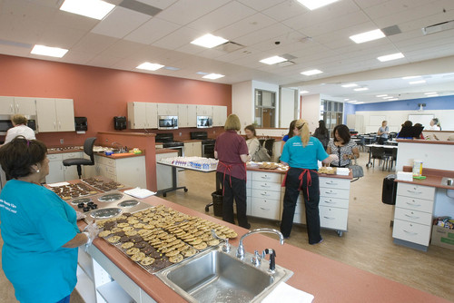 Paul Fraughton  |   Salt Lake Tribune
 A large demonstration kitchen in the new Community Learning Center in the Glendale neighborhood of Salt Lake City was used to make cookies for an open house and tour of the facility. the center will provide educational opportunities for adults and children, as well as providing a medical clinic with dental and vision care available.                          
 Tuesday, September 10, 2013