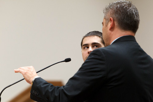 Trent Nelson  |  The Salt Lake Tribune
Joshua Petersen looks for an explanation from his attorney Dusty Kawai. Peteresen pleaded guilty to shooting his baby to Judge Darold McDade Tuesday, September 10, 2013 in 4th District Court in Provo.