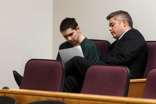 Trent Nelson  |  The Salt Lake Tribune
Joshua Petersen goes over a plea agreement with his attorney Dusty Kawai. Petersen pleaded guilty to shooting his baby to Judge Darold McDade Tuesday, September 10, 2013 in 4th District Court in Provo.