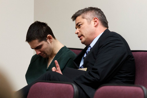 Trent Nelson  |  The Salt Lake Tribune
Joshua Petersen sits with his attorney Dusty Kawai. Petersen pleaded guilty to shooting his baby to Judge Darold McDade Tuesday, September 10, 2013 in 4th District Court in Provo.