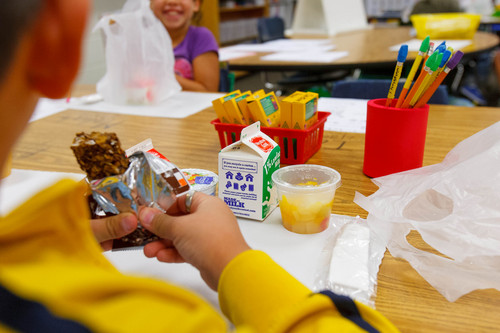 Trent Nelson  |  The Salt Lake Tribune
Students eat breakfast at their desks at Odyssey Elementary School in Ogden Tuesday, September 3, 2013 in Ogden. At three Ogden schools, students have a new breakfast option: milk, juice, fruit and whole-grain items, and a designated breakfast period to start the day.