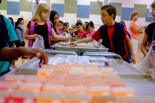 Trent Nelson  |  The Salt Lake Tribune
Students pick up their breakfast at Odyssey Elementary School in Ogden Tuesday, September 3, 2013 in Ogden. At three Ogden schools, students have a new breakfast option: milk, juice, fruit and whole-grain items, and a designated breakfast period to start the day.