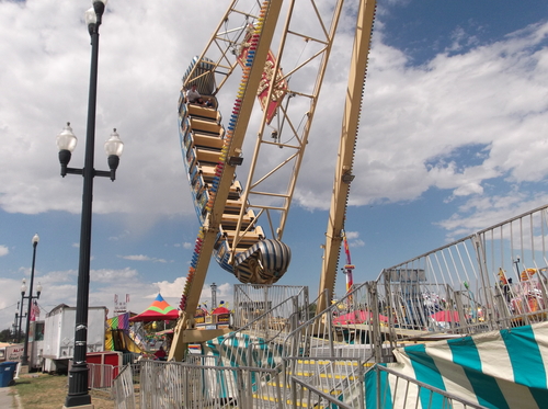 Sean P. Means | The Salt Lake Tribune
A family experiences the swirls and hurls of the Pharaoh's Fury ride at the Utah State Fair.