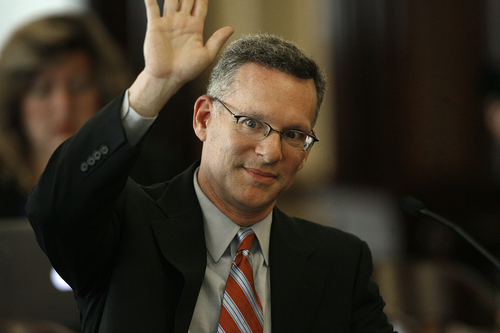 Scott Sommerdorf   |  The Salt Lake Tribune
Special Counsel Steven F. Reich raises his hand to identify himself during his introduction at his appearance at the second meeting of the House Special Investigative Committee looking into allegations of misconduct by Atty. Gen. John Swallow. It was the first public appearance of the special counsel Steven Reich and lead investigator James Mintz, Wednesday, September 11, 2013.