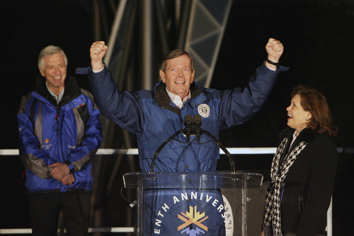 Steve Griffin  |  The Salt Lake Tribune

 Former Utah governor Mike Leavitt raises his arms as he talks during ceremony marking the 10th anniversary of the start of the 2002 Winter Games at Rice Eccles Stadium in Salt Lake City, Utah  Wednesday, February 8, 2012.