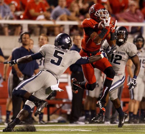 Trent Nelson  |  The Salt Lake Tribune
Utah Utes wide receiver Dres Anderson (6) pulls in a reception as the University of Utah hosts Utah State, college football Thursday, August 29, 2013 at Rice-Eccles Stadium in Salt Lake City.