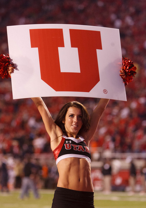 Trent Nelson  |  The Salt Lake Tribune
A Utah cheerleader holds the U aloft as the University of Utah hosts Oregon State, college football at Rice Eccles Stadium Saturday, September 14, 2013 in Salt Lake City.