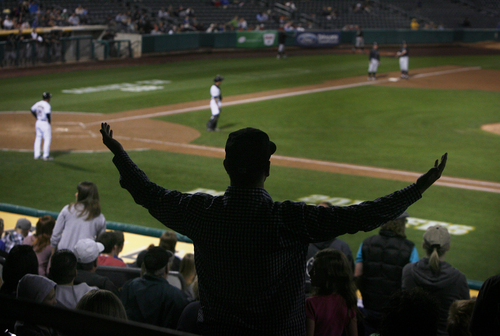 Scott Sommerdorf   |  The Salt Lake Tribune
A Bees fan reacts to the umpiring crew's ruling that allowed 3 runs to score on a ball that was hit into the Bees bullpen in a disastrous eighth inning. After allowing six runs in the inning, the Bees were trailing 10-2 going into their half of the eighth in game 4 of the PCL Championship Series against the Omaha Storm Chasers, Saturday, September 14, 2013.