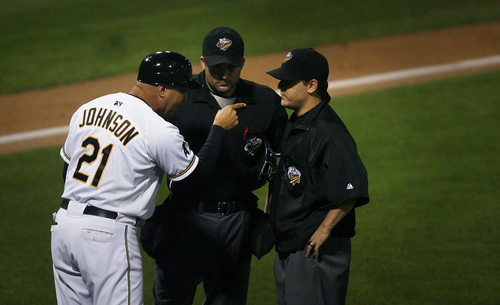 Scott Sommerdorf   |  The Salt Lake Tribune
Bees manager Keith Johnson gives the umpiring crew a piece of his mind after a strange call by 3rd base umpire Scott Mahoney. Mahoney motioned that Omaha's Lane Adams' hit down the third base line was foul, but then the crew conferred and allowed three Omaha runner to score. After that disastrous eighth inning, the Bees trailed 10-2, and eventually lost 10-5 in game 4 of the PCL Championship Series against the Omaha Storm Chasers, Saturday, September 14, 2013.