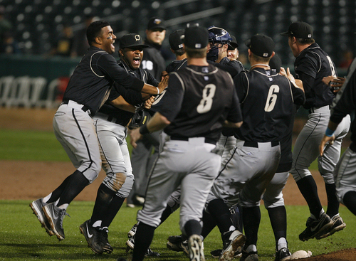 Scott Sommerdorf   |  The Salt Lake Tribune
The Omaha Storm Chasers celebrate their PCL Championship win. After a disastrous six-run eighth inning, the Bees lost game 4 of the PCL Championship Series 10-5 to the Omaha Storm Chasers, Saturday, September 14, 2013.