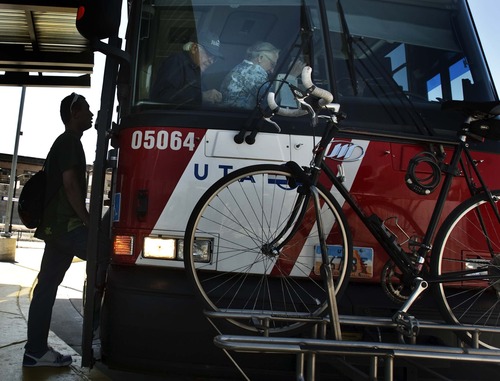 Leah Hogsten  |  Tribune file photo
Riders board the 902 Salt Lake City to Park City UTA bus last summer. The direct bus service between Salt Lake City and Park City has seen a ridership boost since fare was cut and other changes were implemented.
