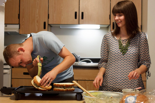 Trent Nelson  |  The Salt Lake Tribune
Jonathan and Courtney Hope prepare dinner in their Provo apartment Wednesday, September 11, 2013. The couple is weighing health insurance options under the Affordable Care Act.