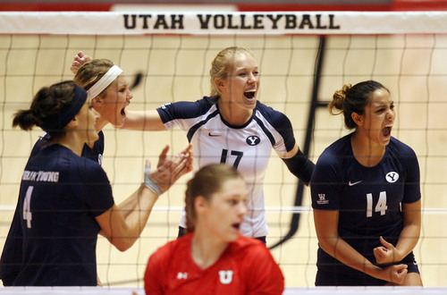 Steve Griffin | The Salt Lake Tribune

BYU players celebrate a point during volleyball match at the Huntsman Center in Salt Lake City, Utah Tuesday Sept. 17, 2013.