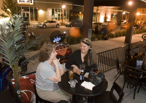 Keith Johnson | The Salt Lake Tribune

Cindy Bradley (left) and Melinda Cullimore have drinks on the patio at The Break sports bar and grill in S. Jordan, Utah, September 11, 2013.