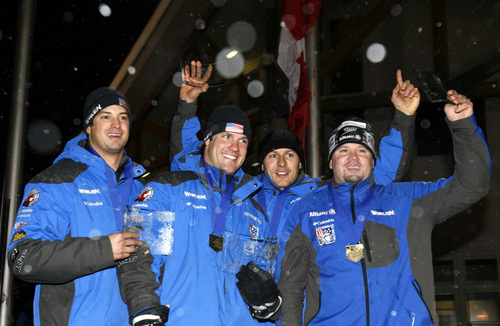 Park City - (left to right) Steve Mesler, Brock Kreitzburg, Pavle Jovanovic, and Steven Holcomb, team members of the USA1 4 Man bobsled celebrate their gold medal finish at the FIBT World Cup Bobsled Competition at the Utah Olympic Park, Saturday, December 8, 2007.
Trent Nelson/The Salt Lake Tribune; 12.08.2007