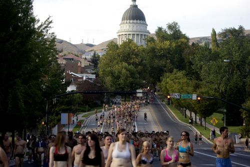 Kim Raff | The Salt Lake Tribune
People run down State Street during the 5k Utah Undie Run in Salt Lake City, Utah on September 9, 2012. Thousands of people gathered in hopes of breaking last years record of 2,270 people which was the largest gathering of people wearing only underpants.