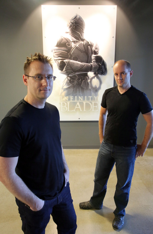 Francisco Kjolseth  |  The Salt Lake Tribune
Brothers and co-founders of Chair Entertainment Donald, left, and Geremy Mustard have a brand new space in South Jordan and recently showed off their latest mobile game for the iPhone, "Infinity Blade 3," which was showcased during the Apple event last week. The new modern space has been filling up with their art along with some of their favorite iconic characters from other games and movies.
