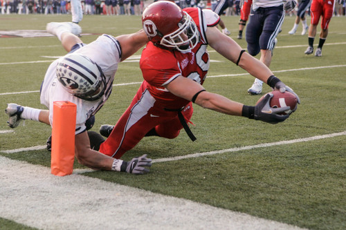 Trent Nelson  |  The Salt Lake Tribune
Utah tight end Colt Sampson (89) stretches into the end zone ahead of Brigham Young linebacker Aaron Wagner (52) in 2006.