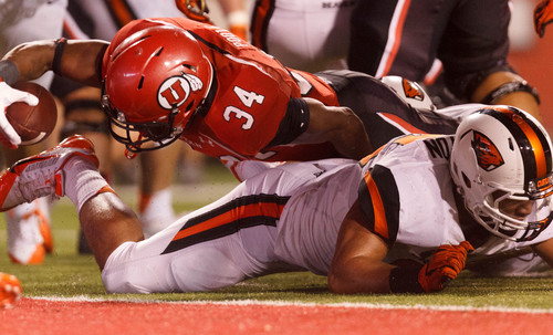 Trent Nelson  |  The Salt Lake Tribune
Utah Utes running back James Poole (34) scores a touchdown in the third quarter as the University of Utah hosts Oregon State, college football at Rice Eccles Stadium Saturday, September 14, 2013 in Salt Lake City.
