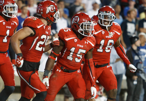 Trent Nelson  |  The Salt Lake Tribune
Utah Utes defensive back Michael Walker (15) celebrates an incomplete pass to Brigham Young Cougars wide receiver Eric Thornton (6) in the fourth quarter as the BYU Cougars host the Utah Utes, college football Saturday, September 21, 2013 at LaVell Edwards Stadium in Provo.