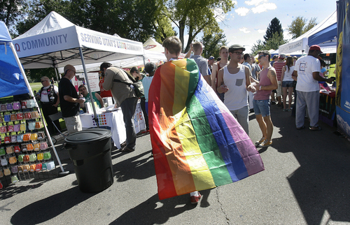 Scott Sommerdorf   |  The Salt Lake Tribune
Sergey Khrushchev, visiting from The Ukraine, walks through Provo's first Pride Festival at Memorial Park in Provo, Saturday, September 21, 2013.