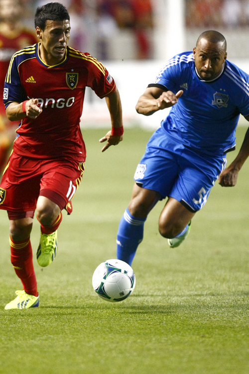 Chris Detrick  |  The Salt Lake Tribune
Real Salt Lake midfielder Javier Morales (11) and San Jose Earthquakes midfielder Brad Ring (5) go for the ball during the game at Rio Tinto Stadium Saturday September 21, 2013.  San Jose is winning the game 2-1 at halftime.