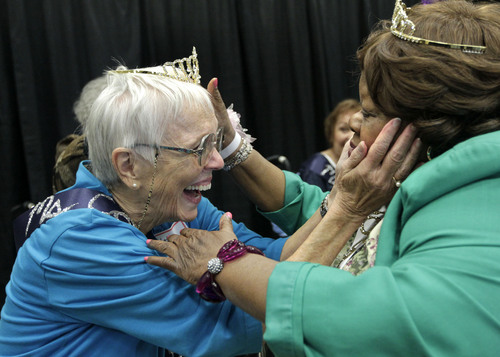 Al Hartmann  |  The Salt Lake Tribune 
Lothele Davis, left, the new Ms. Golden Years 2013 shares a hug with outgoing 2012 Ms. Golden Years Ms. Gerorgia Harper at the Utah Healthcare  Association's 17th annual Mr. and Ms. Golden Years Pageant at the South Towne Expo Center in Sandy Tuesday September 24. It was an inner-and-outer beauty pageant for residents of Utah's long-term care facilities. Contestants ranged in age from the mid-60s to 90-plus years old